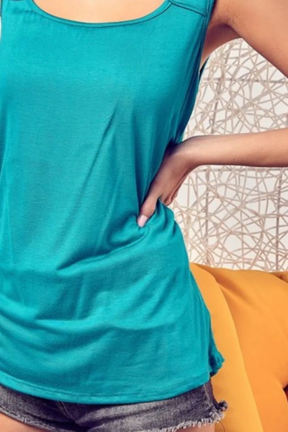 BiBi Rayon Span Knit With Cut Out Front Sleeveless Top - Blu Lotus Boutique