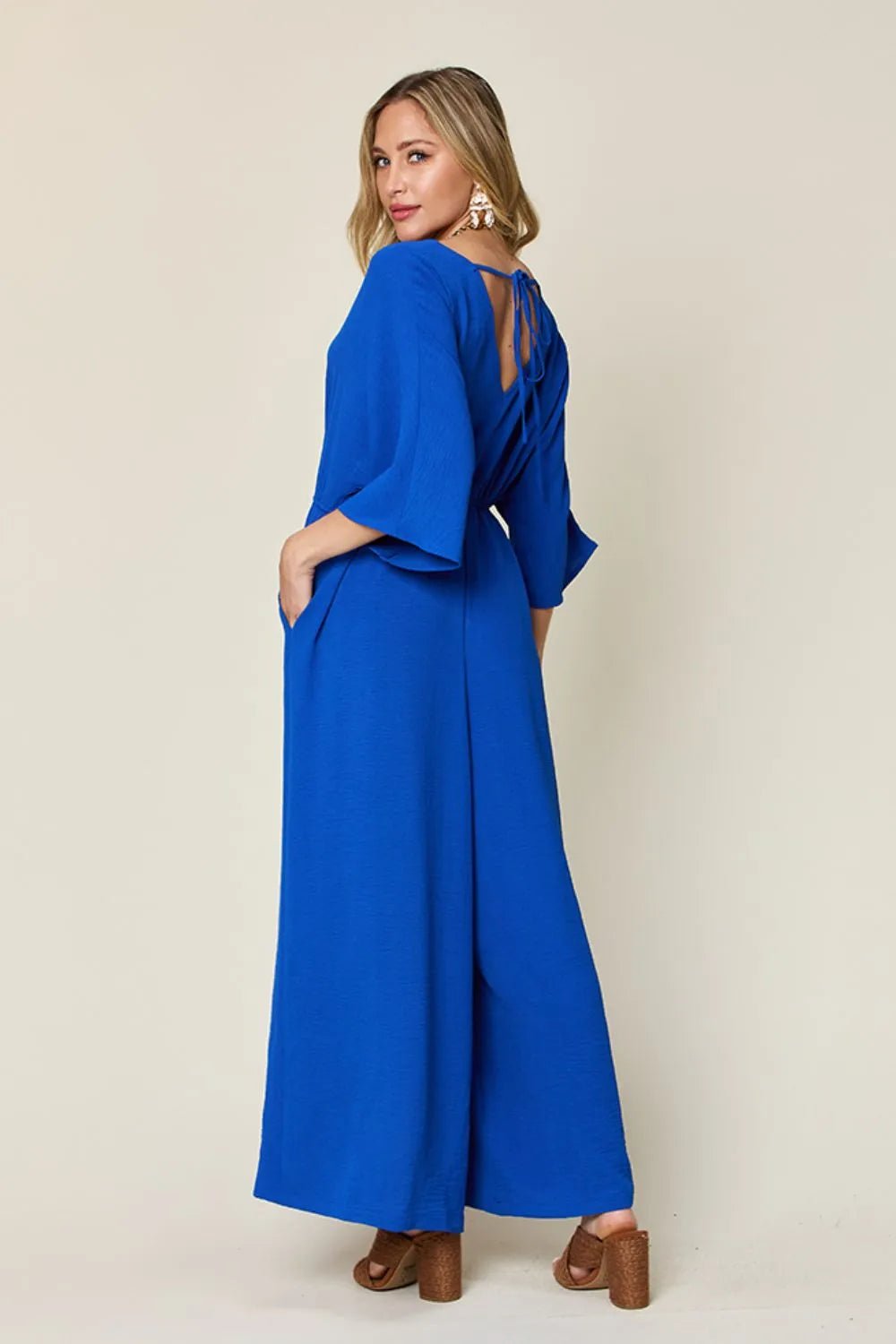 Double Take Full Size Surplice Wide Leg Jumpsuit with Pockets - Blu Lotus Boutique