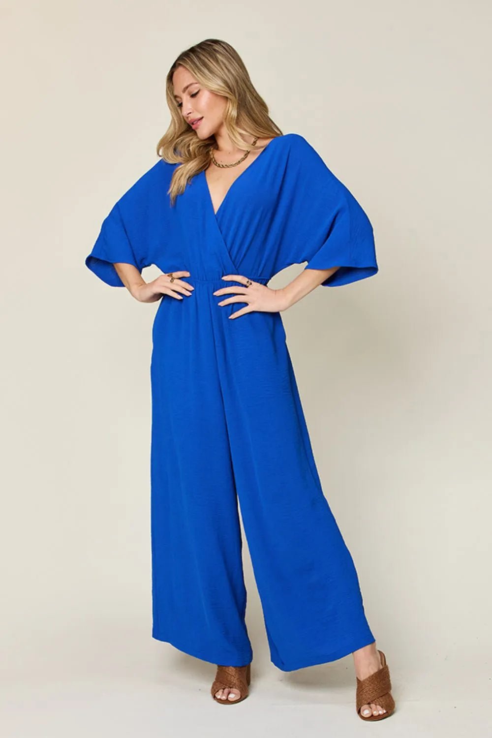 Double Take Full Size Surplice Wide Leg Jumpsuit with Pockets - Blu Lotus Boutique