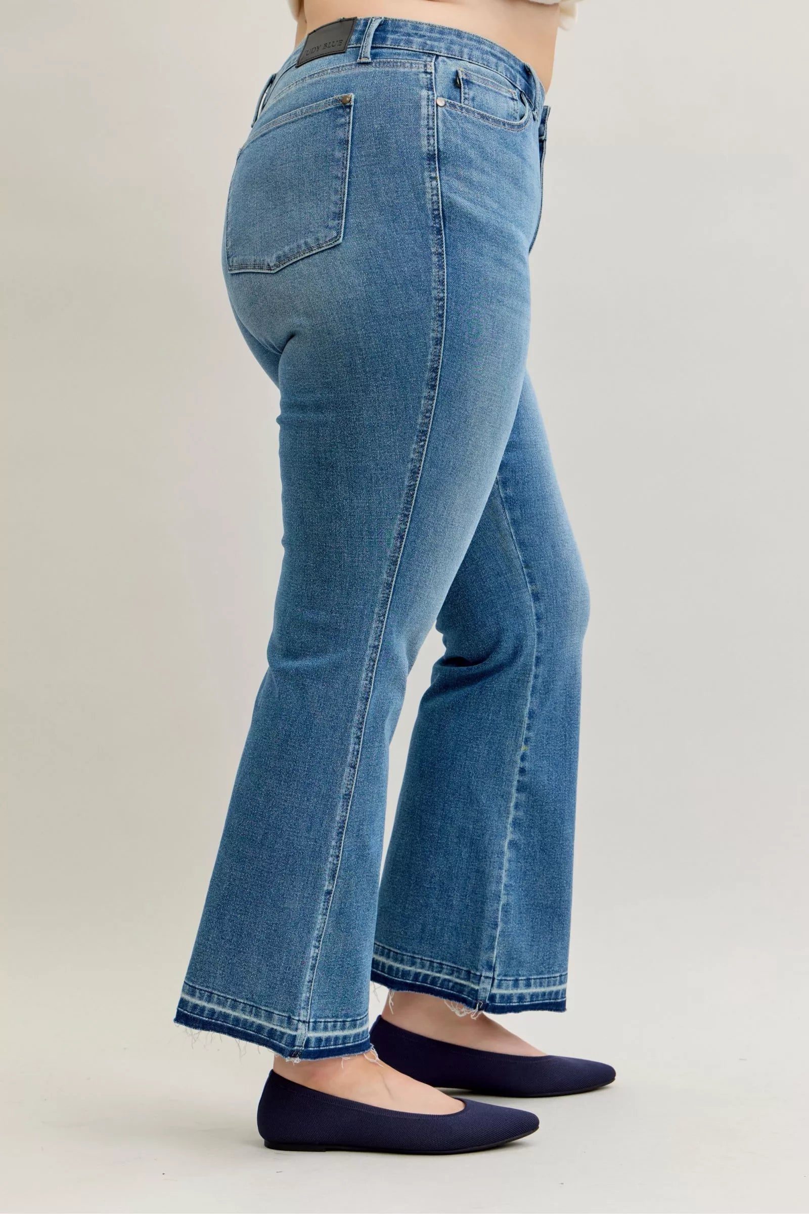 Judy Blue Full Size Mid Rise Slim Bootcut Tummy Control Release Hem Jeans Plus Size - Blu Lotus Boutique