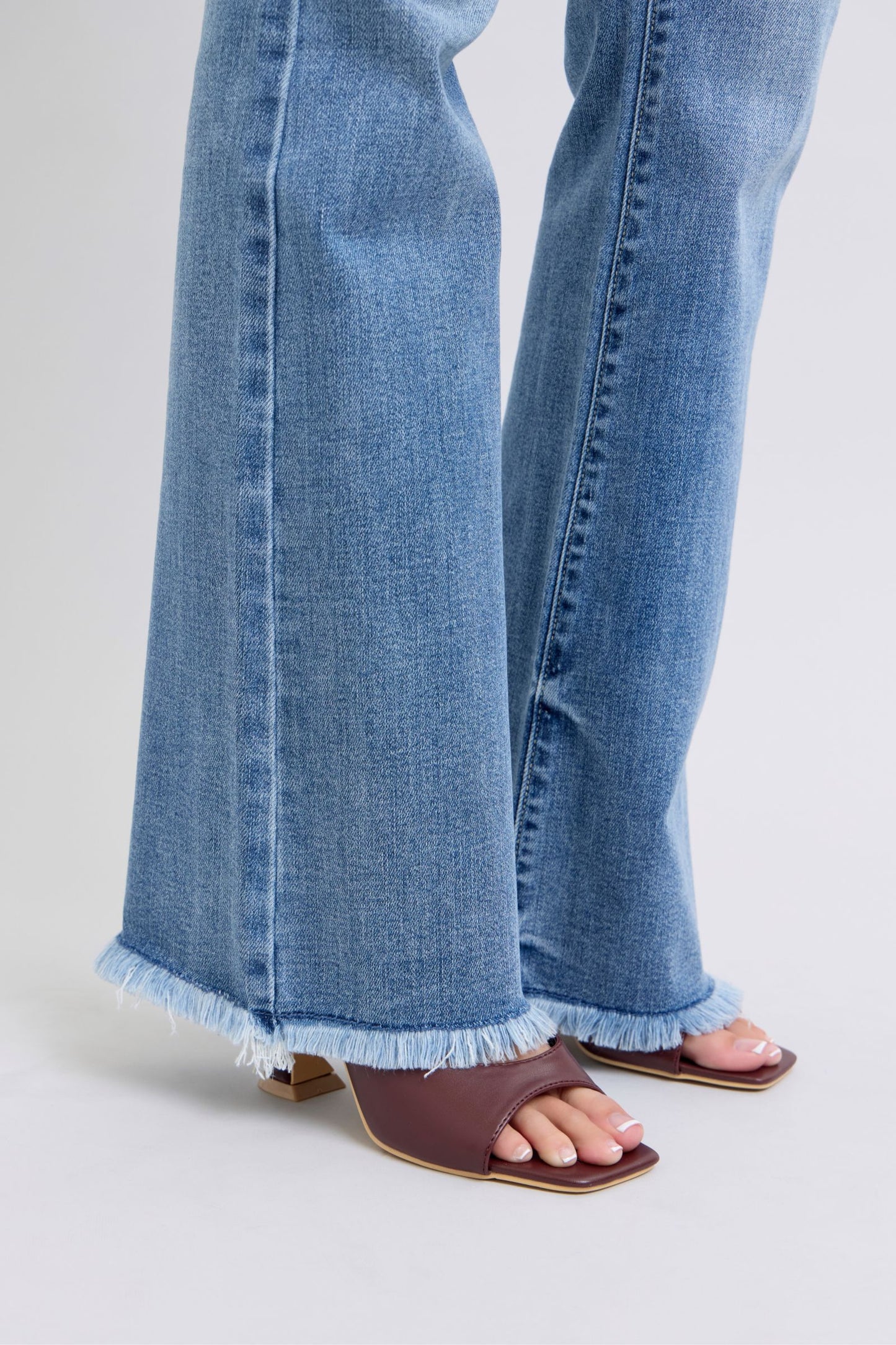 Judy Blue Full Size Raw Hem High Rise Bootcut Jeans - Blu Lotus Boutique