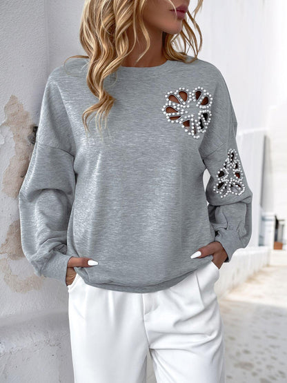 Perfee Cutout Pearl Round Neck Long Sleeve Sweatshirt - Blu Lotus Boutique