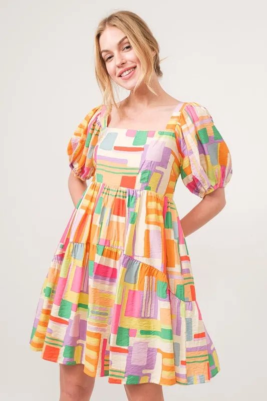 And The Why Square Neck Puff Sleeve Geo Printed Mini Dress - Blu Lotus Boutique