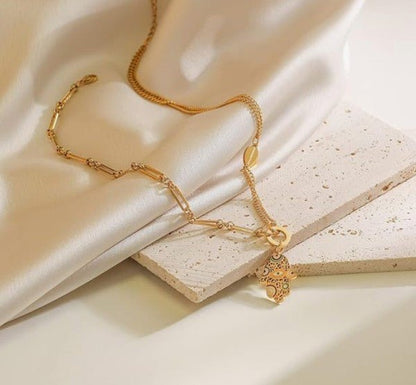 Artistic Hamsa Necklace with Dual Chain Design - Blu Lotus Boutique