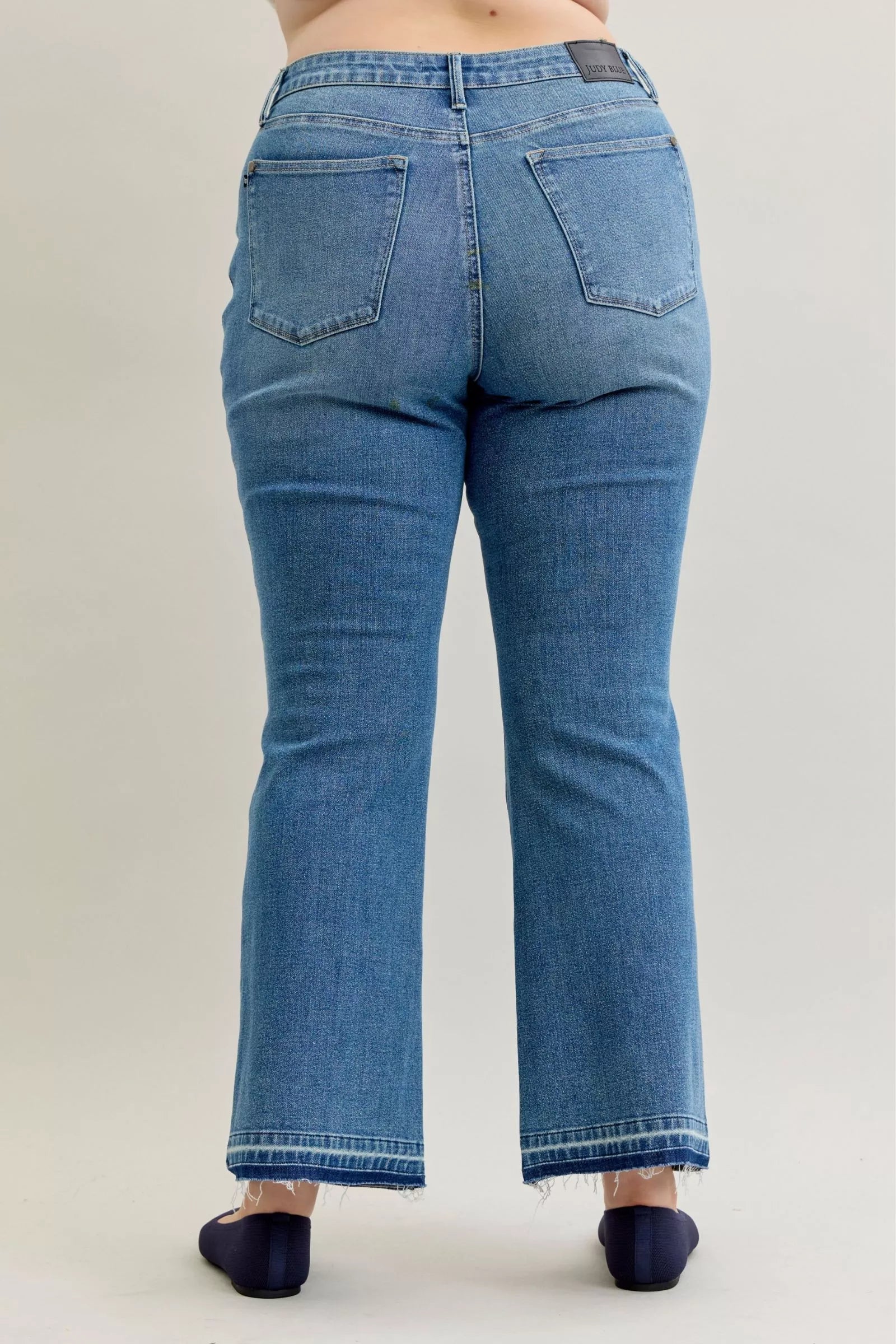 Judy Blue Full Size Mid Rise Slim Bootcut Tummy Control Release Hem Jeans Plus Size - Blu Lotus Boutique