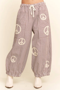 PEACE SIGN PINSTRIPE PALAZZO PANTS - Blu Lotus Boutique