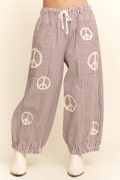 PEACE SIGN PINSTRIPE PALAZZO PANTS - Blu Lotus Boutique