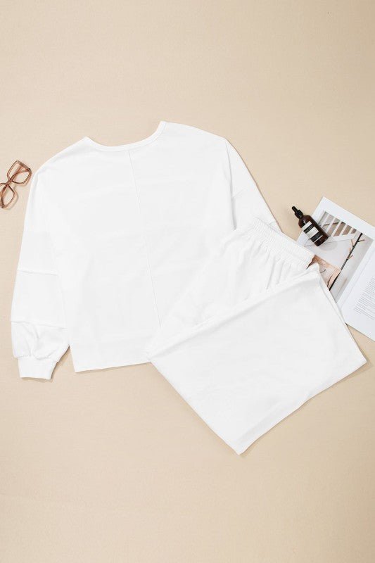 Plus Size Solid Raw Seam Top and Drawstring Pants - Blu Lotus Boutique