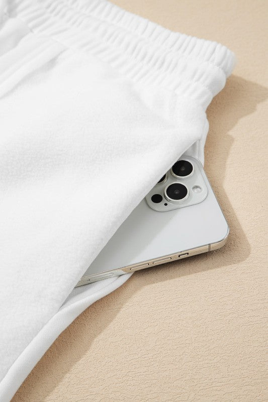 Plus Size Solid Raw Seam Top and Drawstring Pants - Blu Lotus Boutique